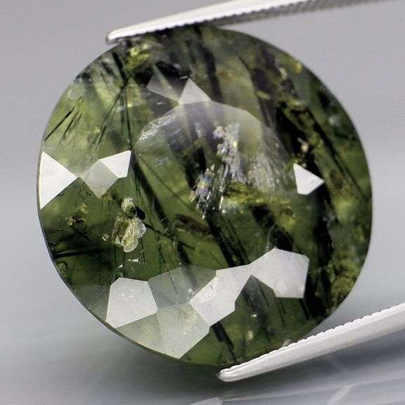 Really cool 20.58ct heavily rutilated Prehnite