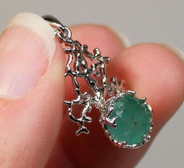 Beautiful sterling silver and Emerald pendant