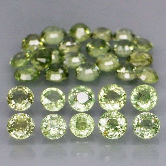 Fantastic 6.21ct diamond cut GREEN Sapphire set