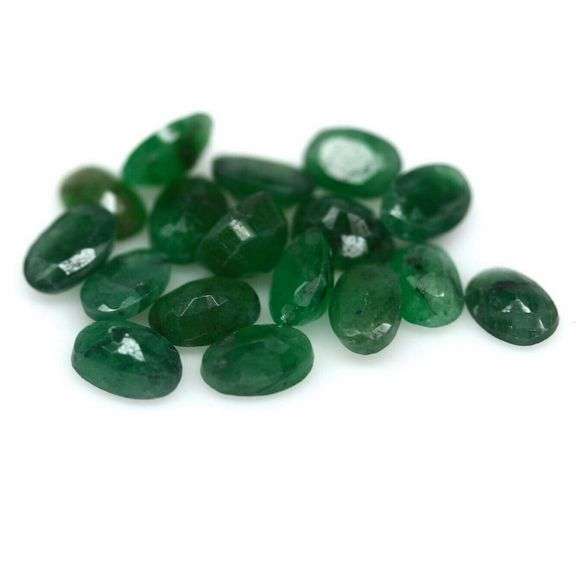 Oval cut 7.39ct Zambian Emerald set