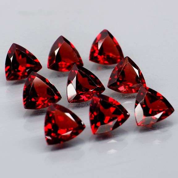 Premium 8.20ct trillion cut cherry red Garnet set