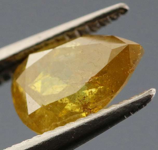Shimmering .59ct yellow Diamond