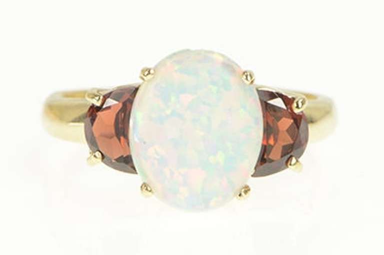 10K Yellow Gold Oval Syn. Opal Garnet Accent Statement Ring