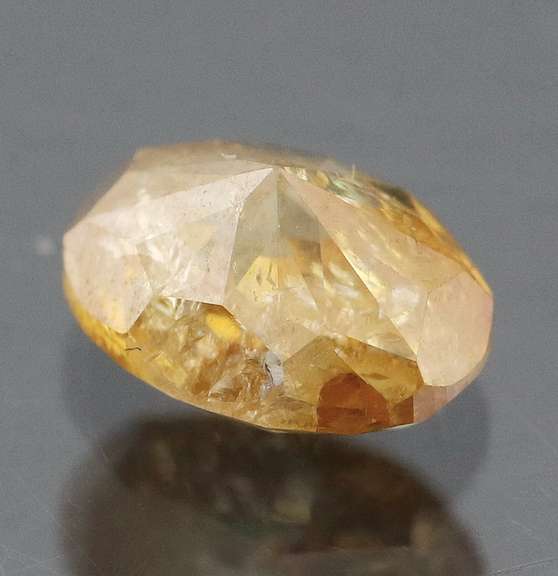 Huge .70ct oval cut yellow Diamond