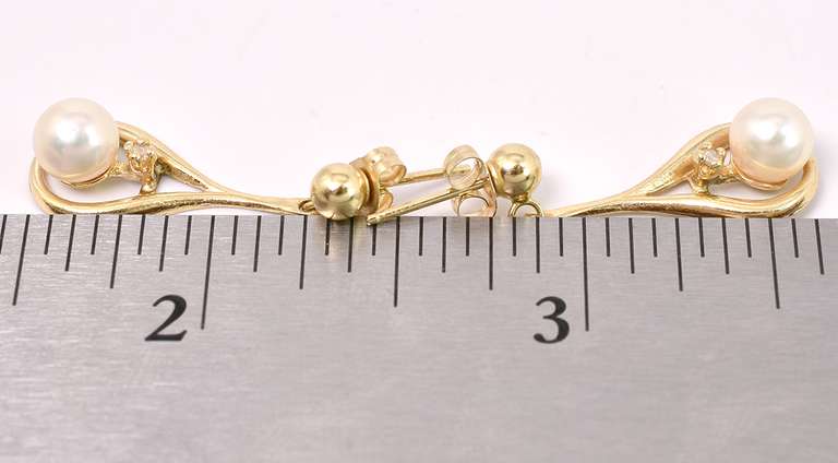 Elegant Dangle Pearl Earrings In 14K Yellow Gold