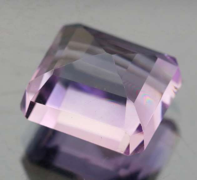 Bright violet 11.07ct emerald cut Amethyst