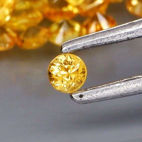 Fantastic 3.82ct diamond cut yellow Sapphire set