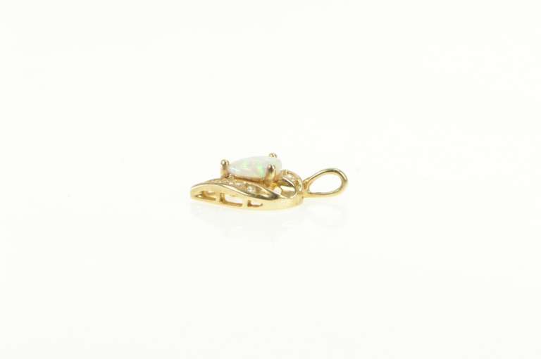 10K Yellow Gold Heart Syn. Opal Diamond Love Symbol Pendant
