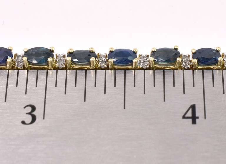 Elegant Blue Sapphire Tennis Bracelet In 14K Yellow Gold