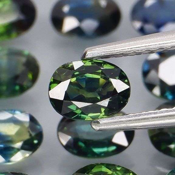 Heated only! 5.70ct oval cut Australian Sapphire set