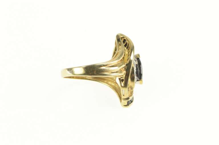 10K Yellow Gold Marquise Sapphire Baguette Diamond Halo Ring