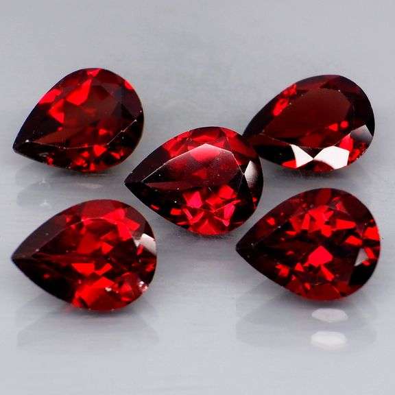 Premium 9.29ct pear cut cherry red Garnet set