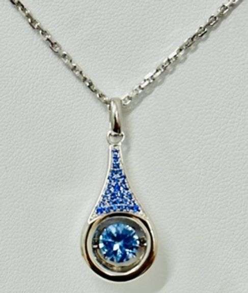 Platinum over 925 non tarnish Sterling silver with large fancy blue pendant