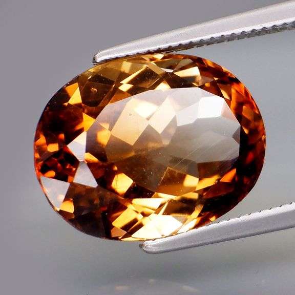 Stunning 8.32ct 14x10mm eye clean Imperial Topaz