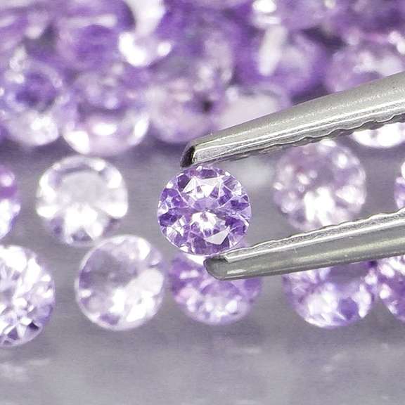 Glittering 4.66ct bright blue violet Tanzanite set