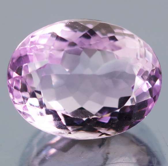 Glittering oval cut 13.65ct violet pink Amethyst