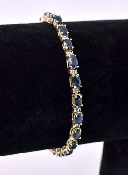 Elegant Blue Sapphire Tennis Bracelet In 14K Yellow Gold
