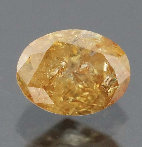 Huge .70ct oval cut yellow Diamond