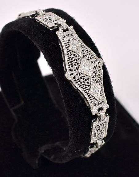 Elegant Diamond Fancy Link Bracelet In White Gold