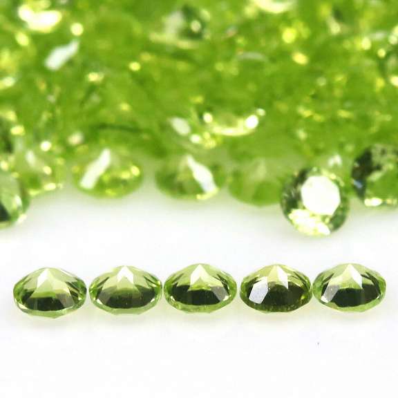 Diamond cut! Unheated! 12.04ct Peridot set