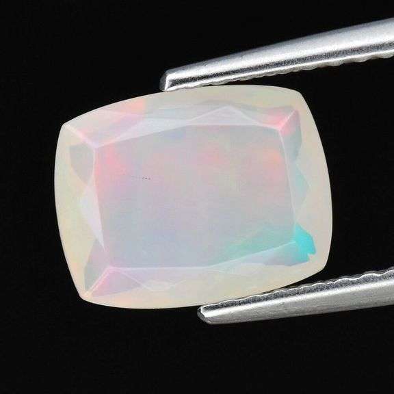 Captivating 1.35ct fully faceted floral fire jelly Opal