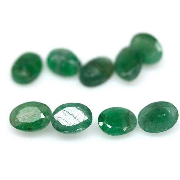 Rich emerald green 6.53ct 9pc emerald set