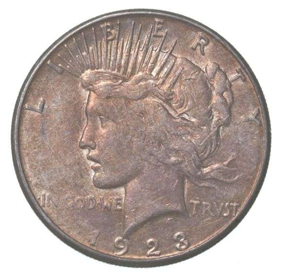 1923-S Peace Silver Dollar Interesting Copper Toning