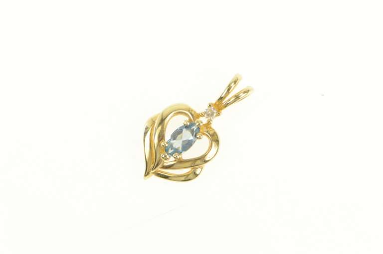14K Yellow Gold Marquise Blue Topaz Diamond Accent Heart Pendant
