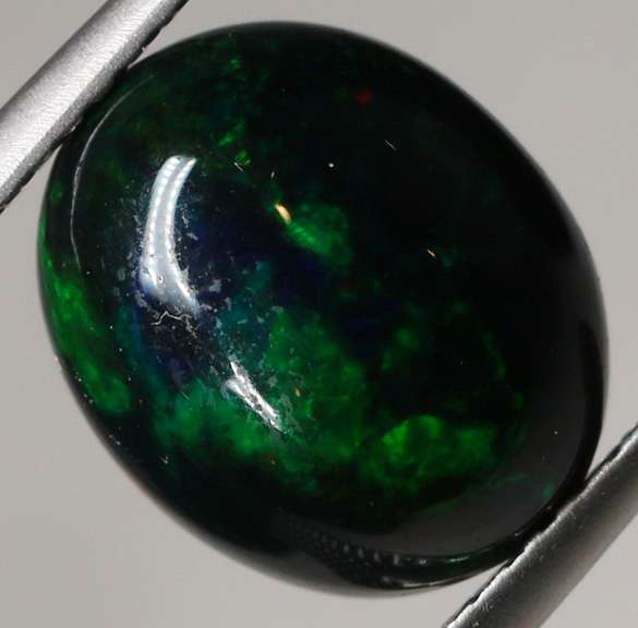 Glistening 2.36ct black Opal cabochon