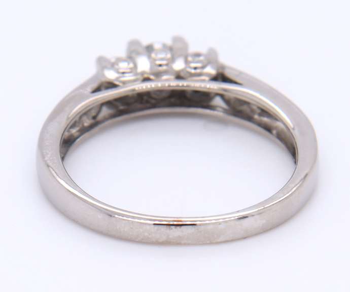 Attractive White Gold Three Stone Channel Set Diamond Shank Engagement Ring