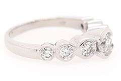 1.70ctw Round Diamond Graduated Bezel Set Ring in 14K