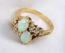 Feminine Opal and Diamond Ring