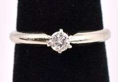 Elegant Solitaire Diamond Ring In 14K White Gold