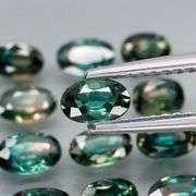 Heated only! 4.48ct blue green Sapphire set