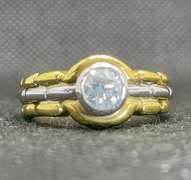 TWO TONE BEZEL SET ROUND DIAMOND ENGAGEMENT RING IN 18K YELLOW GOLD (0.65 C.T. T.W.)