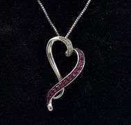Ruby Heart Pendant Necklace In Sterling Silver