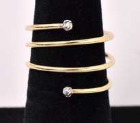 Elegant Spiral Ring In 14K Yellow Gold.
