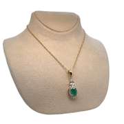 10K GOLD PENDANT WITH EMERALD AND DIAMONDS
