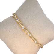 14K YELLOW GOLD BANGLE BRACELET WITH DIAMONDS