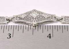 Elegant Diamond Fancy Link Bracelet In White Gold