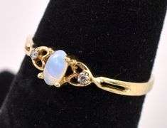 Delicate Opal Ring In Yellow Gold