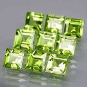 Princess cut 6.91ct apple green Peridot set
