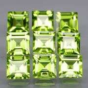 Princess cut 6.91ct apple green Peridot set