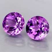 Glittering 6.58ct 10mm violet Amethyst pair