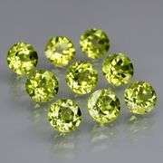 Dazzling 4.76ct untreated apple green Peridot set
