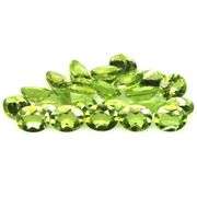 Fantastic 8.42ct 5x4mm oval cut Peridot set