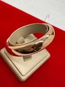 14K GOLD BANGLE BRACELET. HEAVY AND LARGE