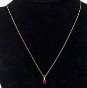 Elegant Ruby Pendant Necklace In 14K Yellow Gold