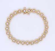 Elegant Yellow Gold Circle Diamond Tennis Bracelet