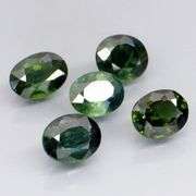 Exotic 3.91ct 5pc green Sapphire set